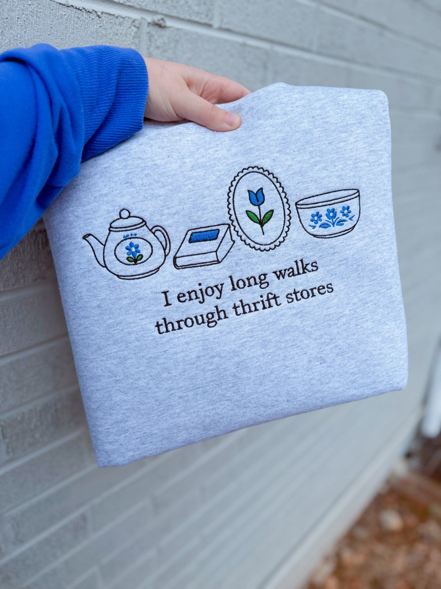 I enjoy long walks through thrift stores embroidered