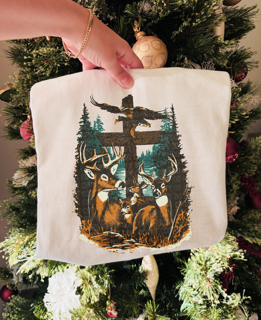 Deer, eagle, cross